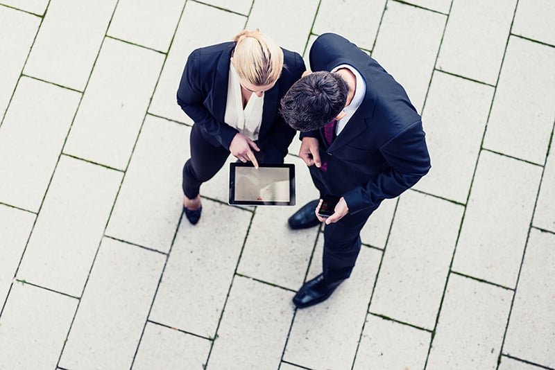 above pointing ipad business female male_lr