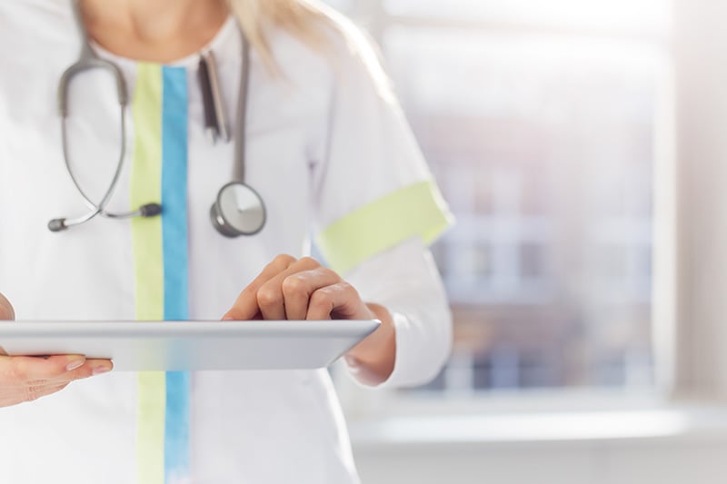 move ipad female doctor healthcare_lr